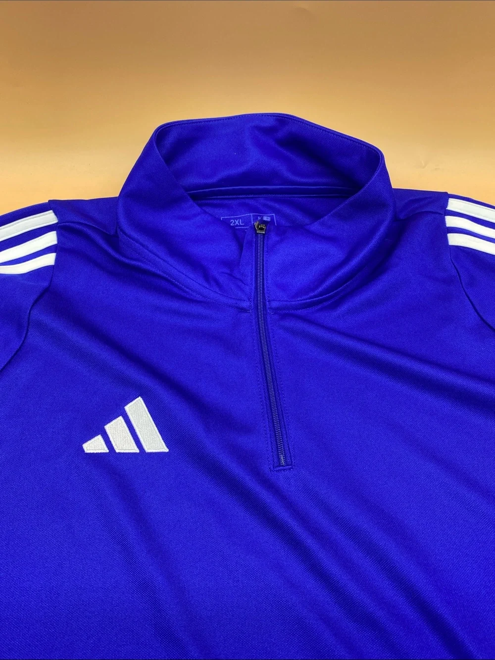 adidas Men’s Royal Blue Half-Zip Track Top with Orange Accents